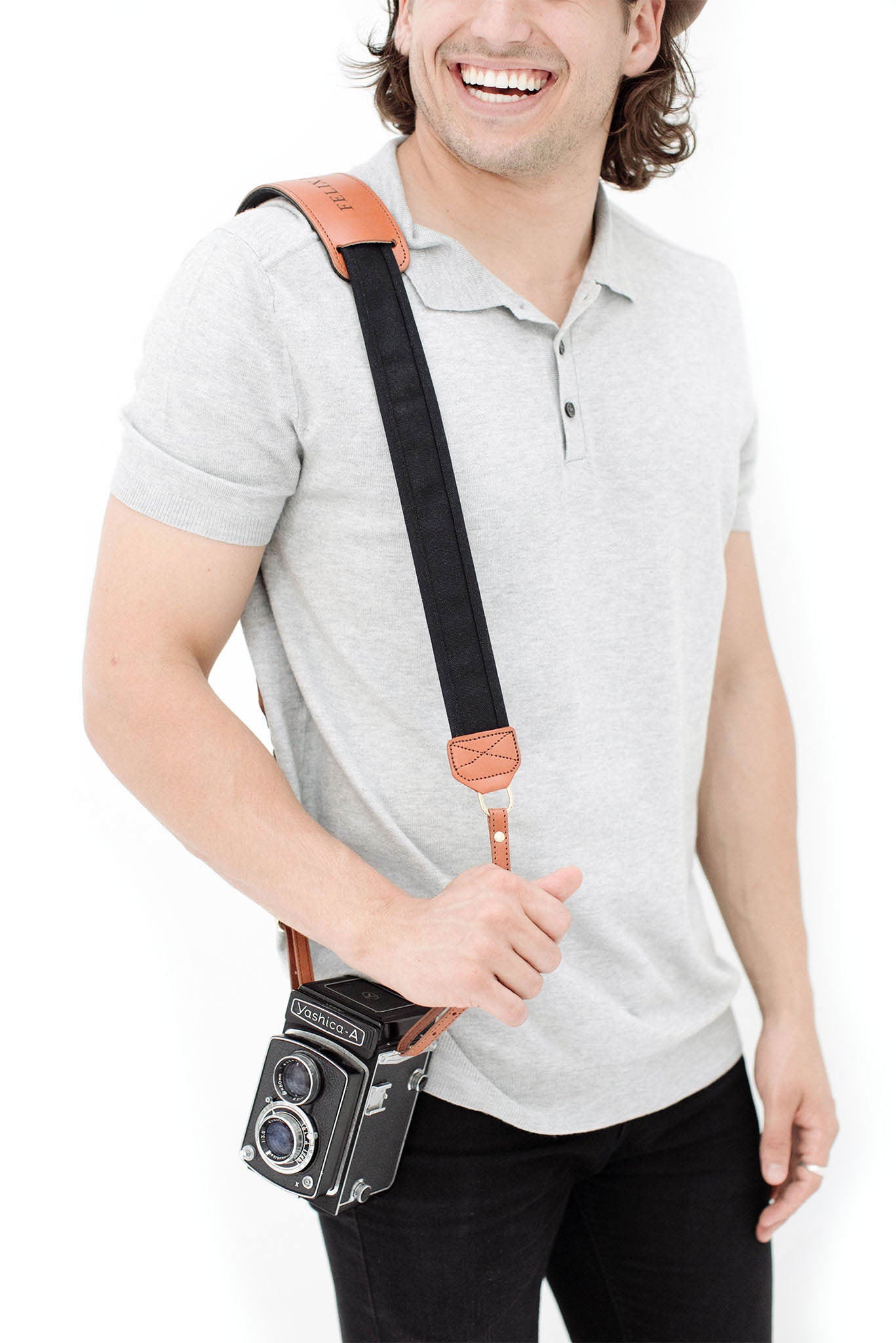 FOTO | Black Fotostrap - a black canvas and genuine leather camera strap that can be personalized with a monogram or business logo, making it the perfect personalized gift! 