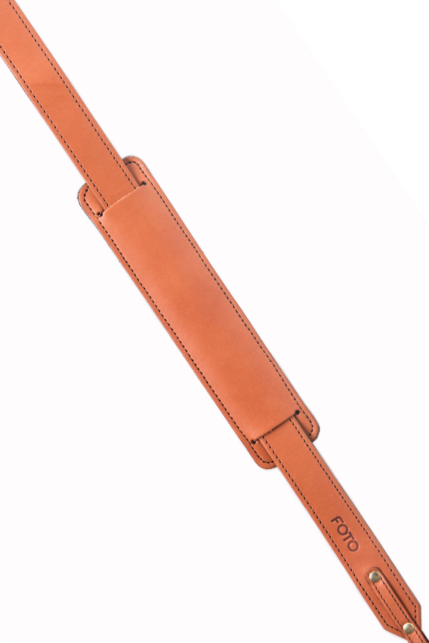 FOTO | The Skinny Cognac - a cognac brown genuine all-leather skinny camera strap that can be personalized with a monogram or business logo, making this leather camera strap the perfect personalized gift.