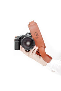 FOTO | James Fotostrap - a cognac brown genuine all-leather camera strap that can be personalized with a monogram or business logo, making this leather camera strap the perfect personalized gift.
