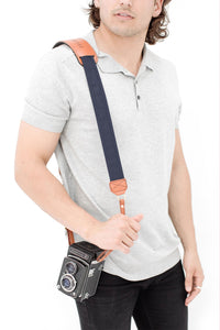 FOTO | Navy Fotostrap - a navy blue canvas and genuine leather camera strap that can be personalized with a monogram or business logo, making it the perfect personalized gift! 