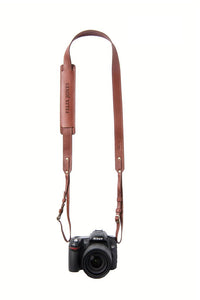 FOTO | The Skinny Dutch - a medium brown genuine all-leather skinny camera strap that can be personalized with a monogram or business logo, making this leather camera strap the perfect personalized gift.