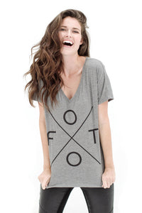 FOTO | Women's "FOTO X" V-Neck Tee - our women's loose fit v-neck is with a super-soft cotton blend, making it your go-to everyday tee. Gives back to Fotolanthropy.