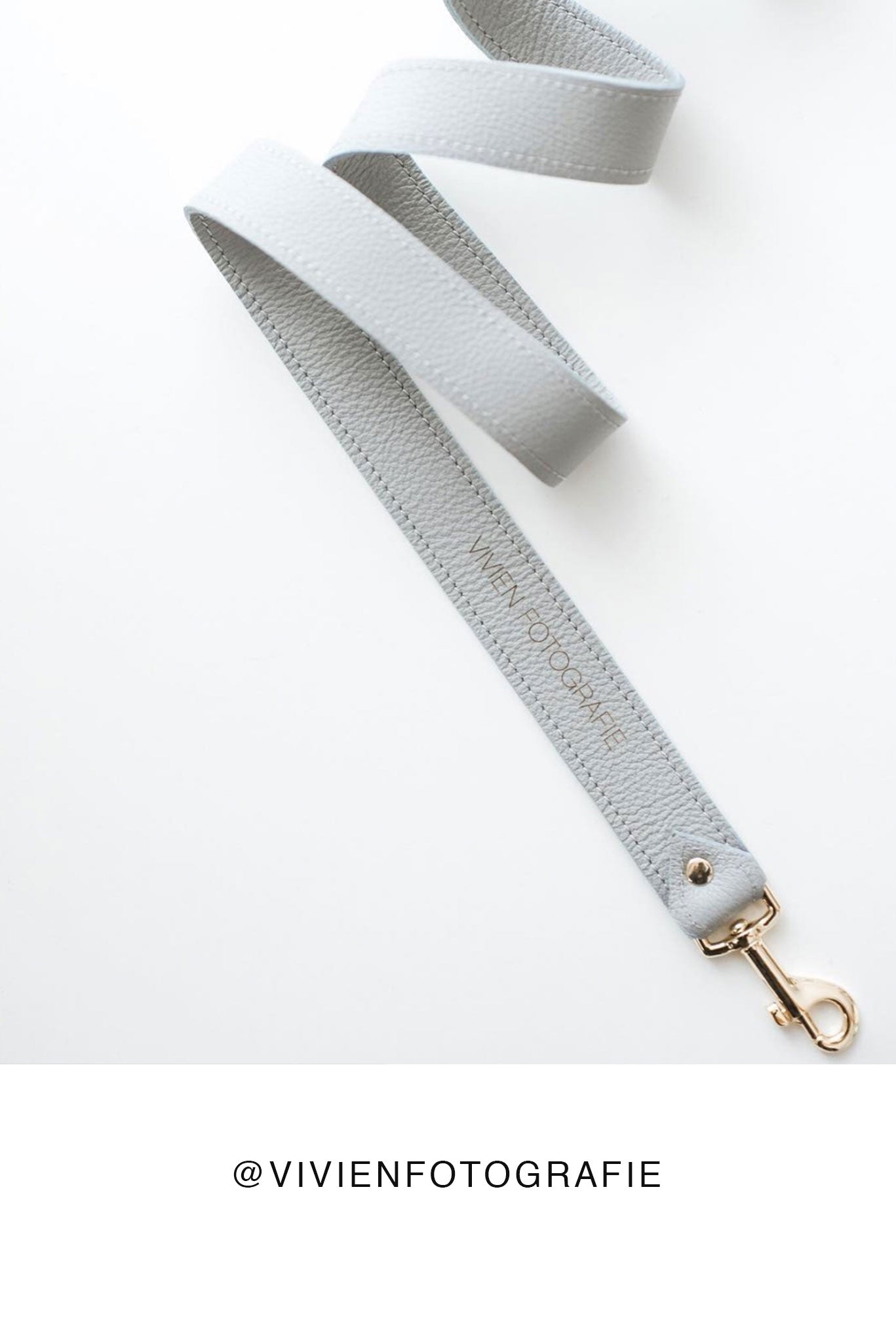 FOTO | The Designer in Dove - a dove grey genuine pebbled leather camera strap that can be personalized with a monogram or business logo, making this leather camera strap the perfect personalized gift.