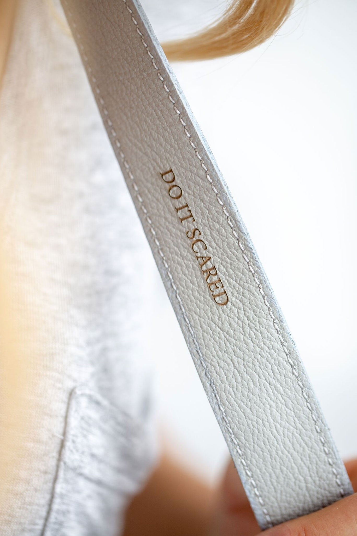 FOTO | The Designer in Dove - a dove grey genuine pebbled leather camera strap that can be personalized with a monogram or business logo, making this leather camera strap the perfect personalized gift.