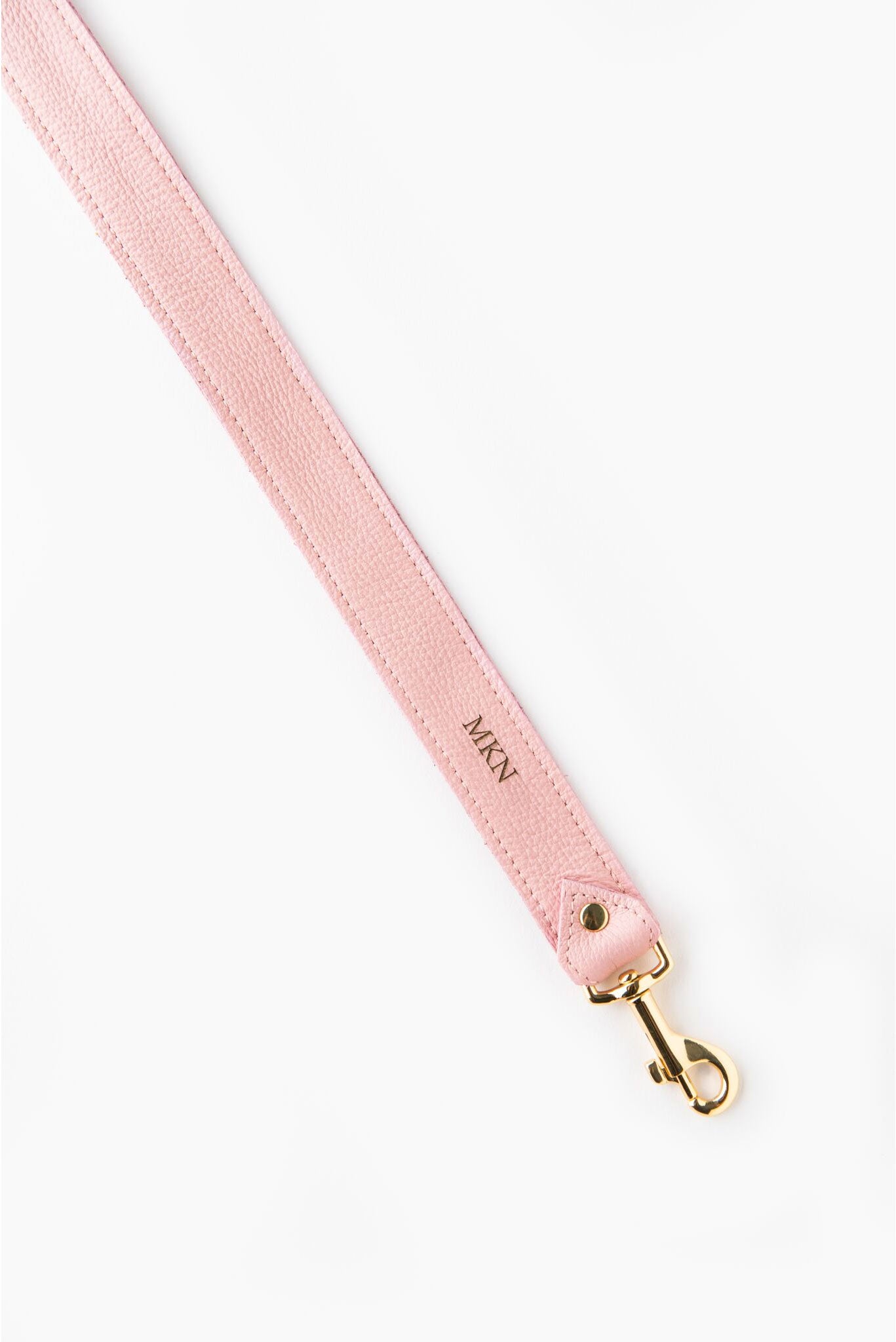 FOTO | The Designer in Rose - a rose pink genuine pebbled leather camera strap that can be personalized with a monogram or business logo, making this leather camera strap the perfect personalized gift.