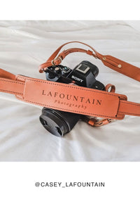 FOTO | The Skinny Cognac - a cognac brown genuine all-leather skinny camera strap that can be personalized with a monogram or business logo, making this leather camera strap the perfect personalized gift.